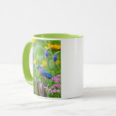 Bluebird male on fence post in flower garden mok (Voorkant links)