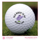 Bluebird over het zetten van groene monogrammen golfballen