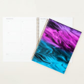 Blurred background fashionable crimson and blue planner (Display)