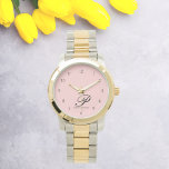 Blush Blossom Script Elegance Watch Horloge<br><div class="desc">Introductie van onze Blush Blossom Script Elegance Watch - een prachtig accessoire dat naadloos verfijning combineert met persoonlijke charme. Dit boeiende uurwerk toont een delicaat script lettertype, met uw eerste initiaal en volledige naam, waardoor een echt uniek meesterwerk ontstaat. Dit horloge is zorgvuldig vervaardigd met materialen van topklasse en is...</div>