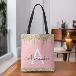 Blush Pink Gold Glitter Elegant Monogram Tote Bag<br><div class="desc">Blush roze en goud faux sprankeling en druppelende glitter elegante monogram boek tas. Deze boekentas kan worden aangepast om uw initiaal en voornaam op te nemen en als cadeau te geven voor kerst,  lieve 16-verjaardag,  Vrijgezellenfeest of een bruiloft.</div>
