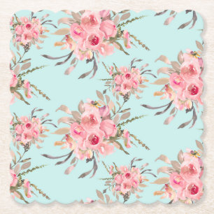 Blush roze bloemen op lichtblauw kartonnen onderzetters