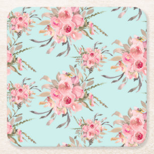Blush roze bloemen op lichtblauw kartonnen onderzetters