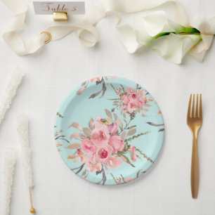 Blush roze bloemen op lichtblauw papieren bordje