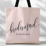 Blush Roze Bruidsmeisje Modern Script Tote Bag<br><div class="desc">Show uw waardering voor uw bruidsfeest met deze stijlvolle blush roze bruidsmeisje canvas tas. Met modern script en aanpasbaar met de naam van uw bruidsmeisje, deze canvas tas is zowel praktisch als elegant. De zachte kleur en het chique ontwerp maken het perfect voor het dragen van bruiloft dag benodigdheden of...</div>