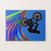 BMX op een regenboogweg Legpuzzel (Horizontaal)