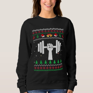 Bodybuilder met een lelijke kerstbeker als juffrou trui