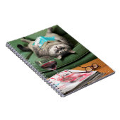 Boek met cat-lezen onderaan notitieboek (Rechterzijde)