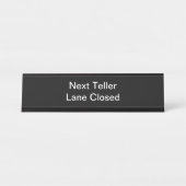 Boekbod op verkoper gesloten bureau naambordje (Voorkant)