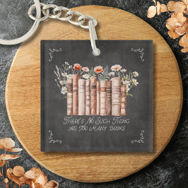 Boeken met bloemen en citaat op zwart schoolbord sleutelhanger