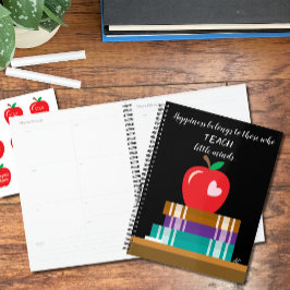 Boeken, rode Apple en Quote Teacher Planner