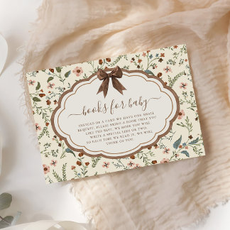 Boeken voor de baby shower met een rustieke bloemm informatiekaartje