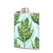 Boeket van lelie van de vallei bloemen op blauw heupfles (Links)