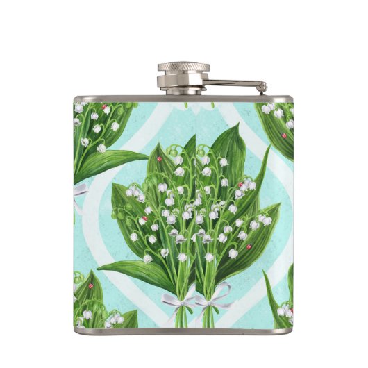 Boeket van lelie van de vallei bloemen op blauw heupfles (Achterkant)