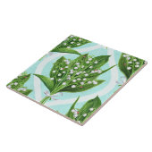 Boeket van lelie van de vallei bloemen op blauw tegeltje (Zijkant)