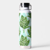 Boeket van lelie van de vallei bloemen op blauw waterfles (Achterkant)