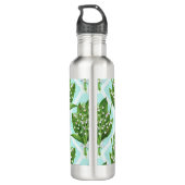 Boeket van lelie van de vallei bloemen op blauw waterfles  (Achterkant)