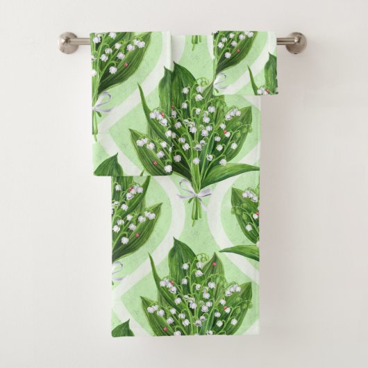 Boeket van lelie van de vallei bloemen op groen bad handdoek (Insitu)