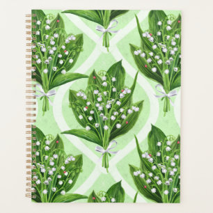 Boeket van lelie van de vallei bloemen op groen planner