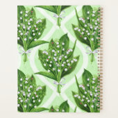 Boeket van lelie van de vallei bloemen op groen planner (Achterkant)