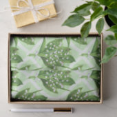 Boeket van lelie van de vallei bloemen op groen tissuepapier (Geschenk)