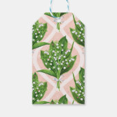 Boeket van lelie van de vallei bloemen op roze cadeaulabel (Achterkant)