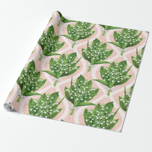Boeket van lelie van de vallei bloemen op roze cadeaupapier (Uitgerold)