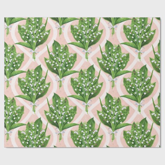 Boeket van lelie van de vallei bloemen op roze cadeaupapier (Vlak)