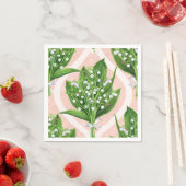 Boeket van lelie van de vallei bloemen op roze servet (Insitu)