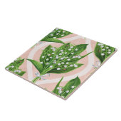 Boeket van lelie van de vallei bloemen op roze tegeltje (Zijkant)