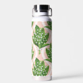 Boeket van lelie van de vallei bloemen op roze waterfles (Achterkant)