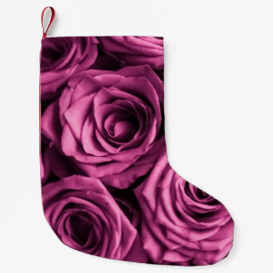 Boeket van paarse rozen, bloemenachtergrond kleine kerstsok