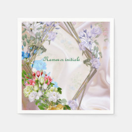 Boeketten van meerkleurige rozen op zijden texture servet