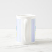 Boekmeisje dat voorzitter is, blauw geel porselein kop (Achterkant)