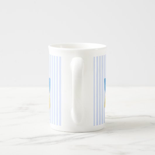 Boekmeisje dat voorzitter is, blauw geel porselein kop (Achterkant)