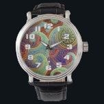 Bohemian Paisley Timeless Pattern Horloge<br><div class="desc">Een mooi paislemotief hier getoond in een harmonieus scala van rijke juweeltonen. Het paisleyontwerp traceert zijn oorsprong terug naar Perzië en de Sassanid-dynastie, een periode die teruggaat tot ongeveer 221AD. De kenmerkende vorm ervan, die varieerde van een scheurval, een nier of zelfs dat de meeste exotische vruchten van de Mango...</div>