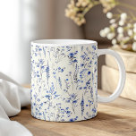 Boho Navy Blauwe Waterverf Wildbloemen Koffiemok<br><div class="desc">Begin uw dag met een vleugje boho charme met behulp van de "Boho Navy Blue Waterverf Wildflowers Coffee Mok." Deze prachtig ontworpen mok heeft delicate marineblauwe wilde bloemen in een waterverf stijl, die een elegante en serene uitstraling geven aan uw ochtendkoffie of -thee. Het ingewikkelde bloemenpatroon wikkelt zich rond de...</div>