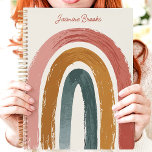 Boho Painted Rainbow Aangepaste naam Planner<br><div class="desc">Dit levendige ontwerp is voorzien van een handgeschilderde boho regenboog in warme en gedurfde tinten van blush, terracotta, oker en diep blauwgroen. De getextureerde penseelstreken voegen een modern, artistiek gevoel toe, terwijl de aangepaste naam die elegant bovenaan wordt weergegeven, het echt persoonlijk maakt. Perfect voor het organiseren van taken, journaling...</div>