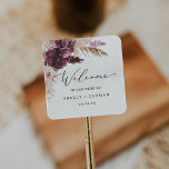 Boho Pampas Grass Wedding Welkom Vierkante Sticker<br><div class="desc">Deze boho pampa's stickers zijn perfect voor een zomerbruiloft. Het ontwerp van de waterverf van de bloem is voorzien van bohemiene bruine en wazige roze bloemen met sprieten van neutraal pamapgras en gouden gedroogde palmbladeren. Pas deze stickers aan met de locatie van je bruiloft, namen en trouwdatum. Deze etiketten zijn...</div>