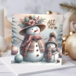 Boho Sneeuwvrouw en Kind Vrolijk Kerstfeest Feestdagenkaart<br><div class="desc">Daag de kou uit door een warme boho kerstsneeuw vrouw en kind begroeting te sturen. Sneeuwvrouw is gekleed in een roze, blauwgroen blauw, en tan warme sjaal en mooie bloemige stro pet. Het kind heeft een soortgelijke kleur gebreide pet en sjaal. Deze begroeting zal zeker een aantal harten verwarmen. Sjablonen...</div>