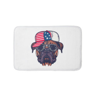 Bokser hond draagt wit rood blauw badmat