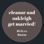 Bold Typography Warm Brown Modern Wedding Custom Ronde Sticker<br><div class="desc">This personalized wedding sticker in brown features bold modern typography with a warm,  minimalist layout. Customize the names,  date,  and location to match your celebration details. A versatile option for wedding favors,  envelopes,  welcome bags,  and day-of decor. Designed to coordinate seamlessly with modern and neutral wedding styles.</div>