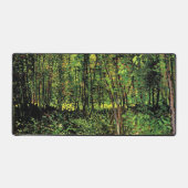 Bomen en ondergroei door Vincent van Gogh Bureaumat (Voorkant)
