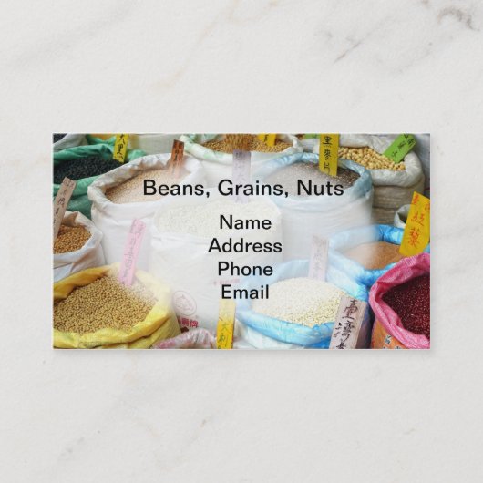 Bonen, korrels en noten voor verkoop in grote zakk visitekaartje (Voorkant)