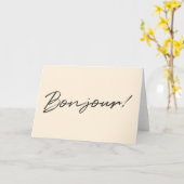 Bonjour. | Moderne Script Cream Ivory French Hallo Kaart (Gele Bloem)