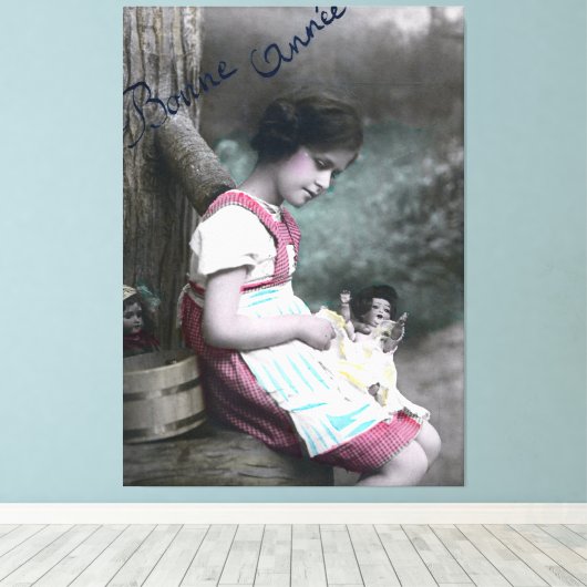 Bonne Année meisje met pop Canvas Afdruk (Insitu (Houten vloer))