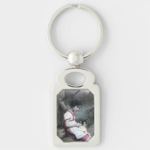 Bonne Année meisje met pop Sleutelhanger