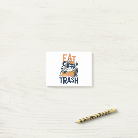 Bont wasbeer met eet afval tekst post-it® notes (Op bureau)