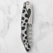 Bontachtergrond zwarte en witte koe kurkentrekker (Achterkant)