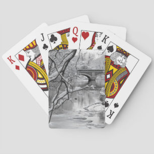 Boogbrug over bevroren rivier in de winter pokerkaarten